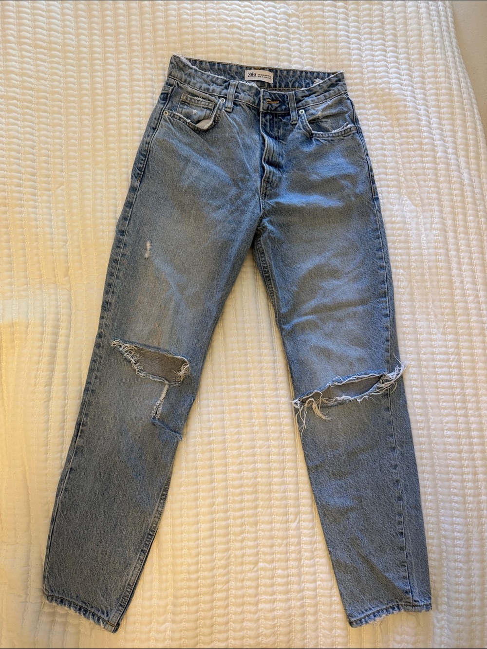 Zara women’s Light Blue Relaxed Ripped Jeans
